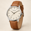 Desejonk Ivory watch with ivory dial, silver-tone round case and tan strap, front view.