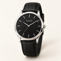 Desejonk Obsidian watch with black dial, silver-tone round case and black strap, front view.